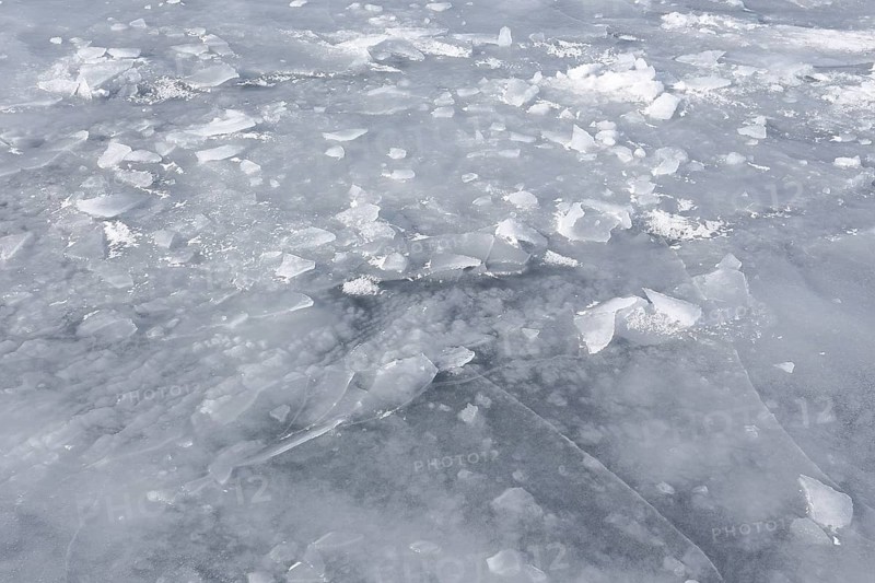 Chunks of ice on a frozen surface