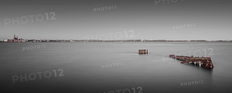 Long exposure of an old rusty jetty on the Baltic Sea coast off Stralsund