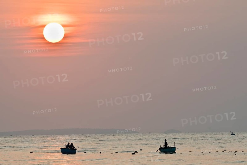 Fishing boats at sunrise