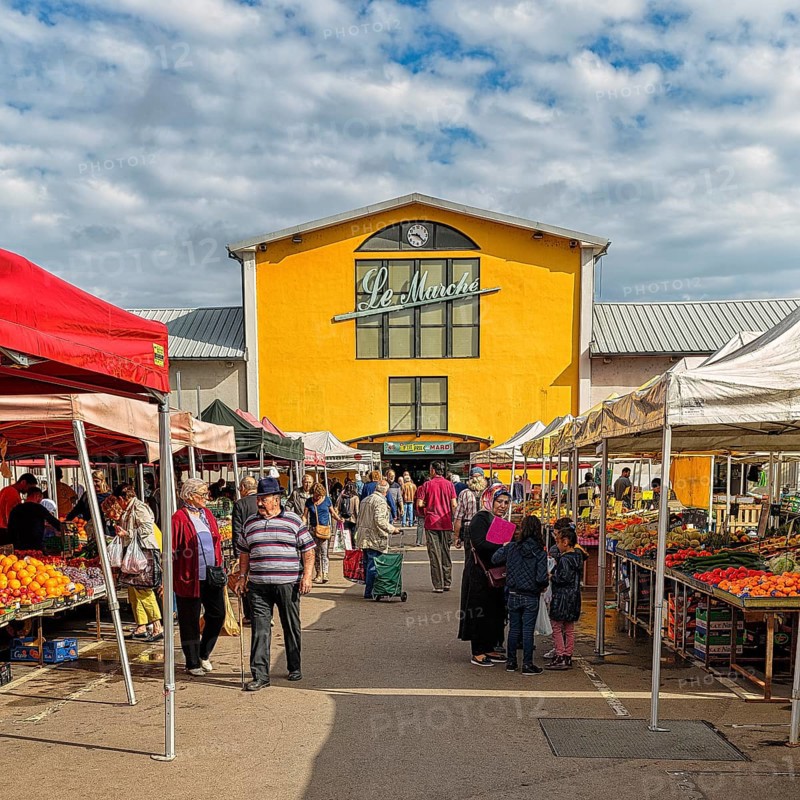 People at a weekly market market