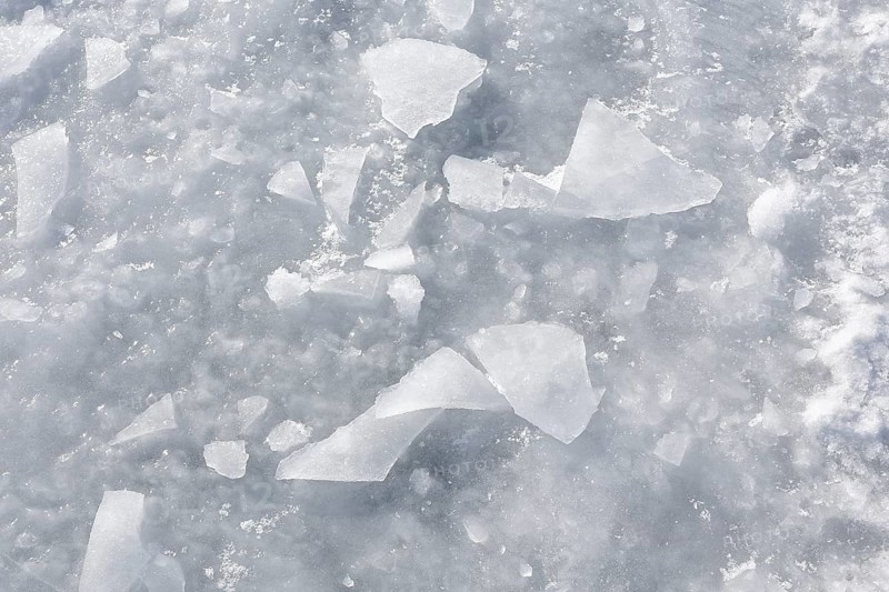 Chunks of ice on a frozen surface