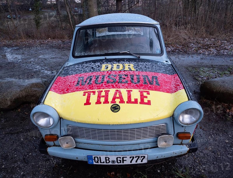 Advertisement for the GDR Museum in Thale on a Trabant in the colours black