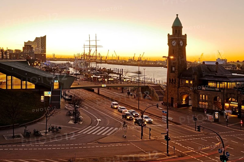 Elbe Philharmonic Hall with clock tower and gauge tower at sunrise