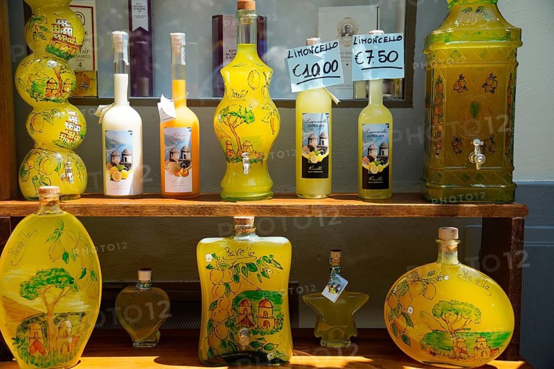 Bottles of Limoncello outside a shop in Ravello