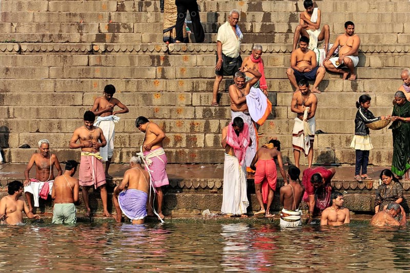 Worshippers on the banks of the Ganges during ritual ablutions in Varanasi