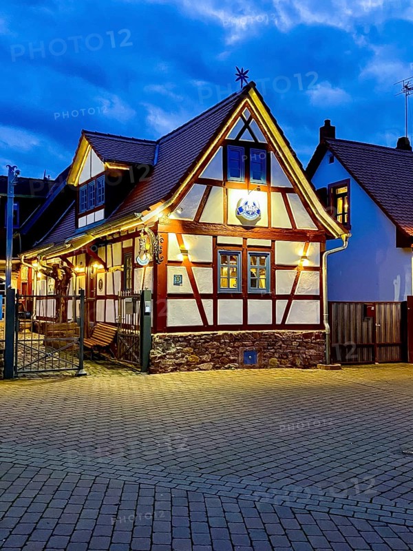 Old half-timbered house at dusk