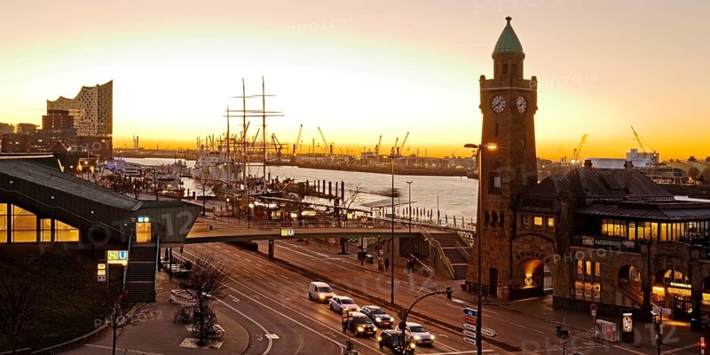 Elbe Philharmonic Hall with clock tower and gauge tower at sunrise