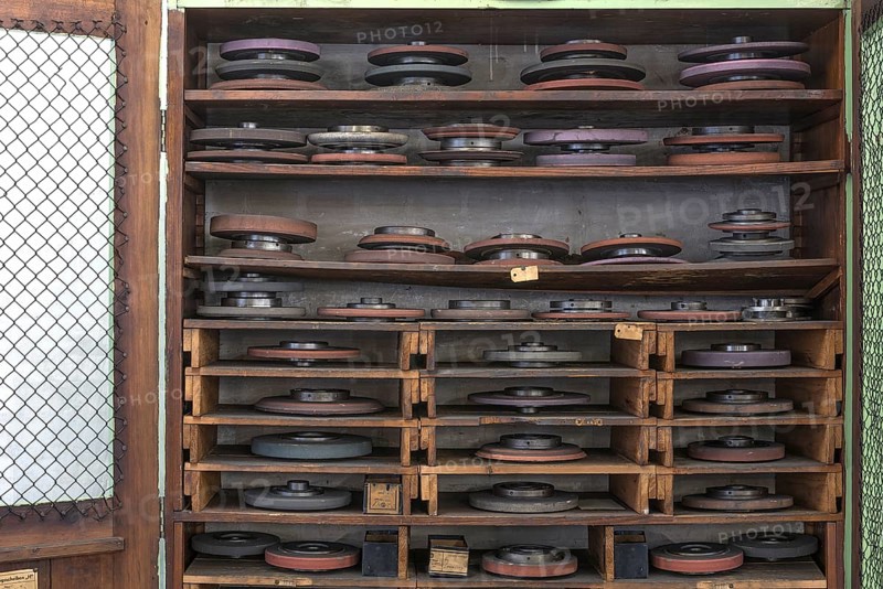 Cupboard with grinding wheels in a historic lathe shop