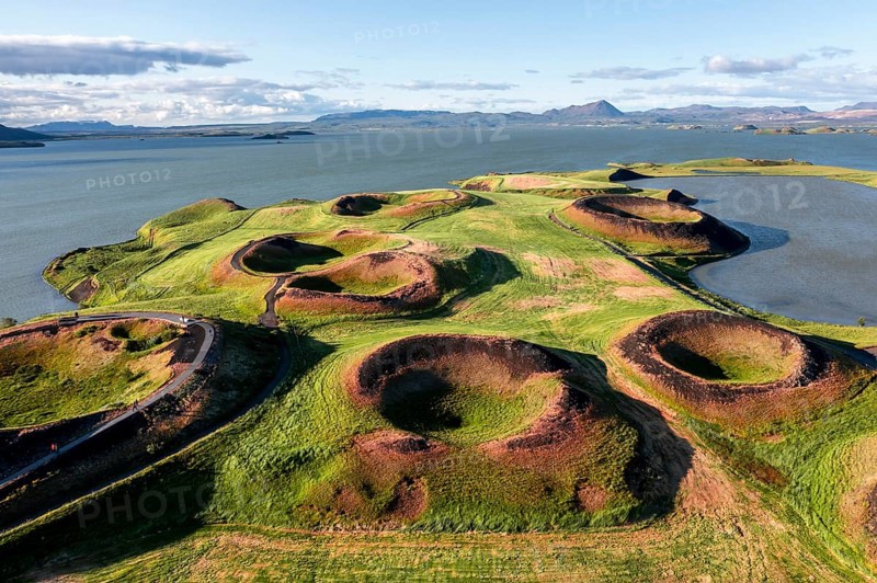 Aerial view of green volcanic crater