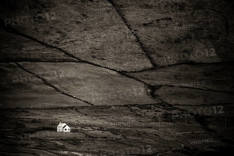 Small house in barren landscape