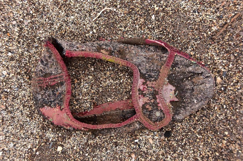 Fragment of slipper on the beach