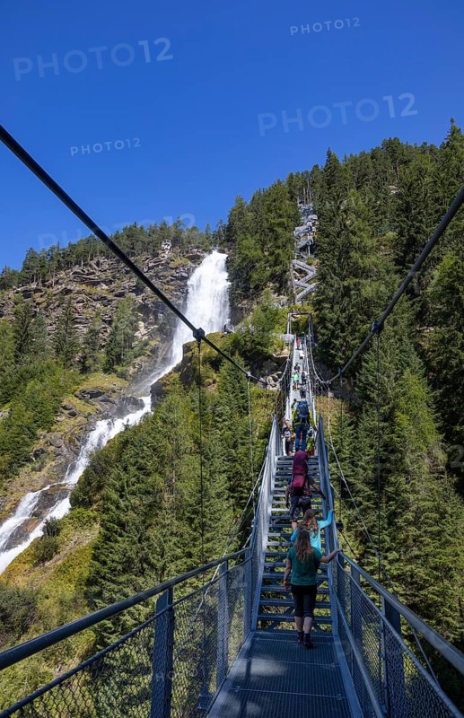 Hiking trail over a suspension bridge along the Stuibenfall near Umhausen