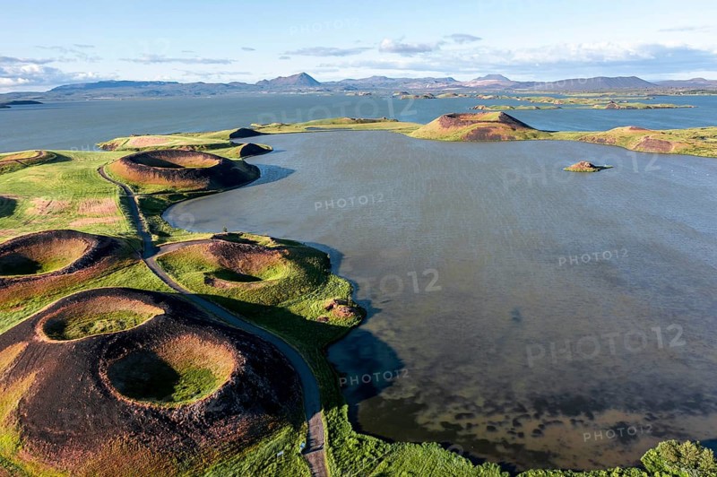 Aerial view of green volcanic crater
