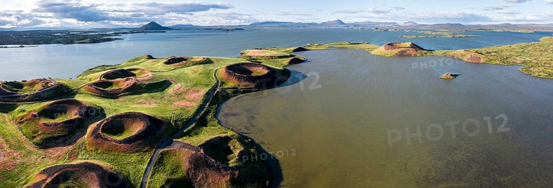 Aerial view of green volcanic crater