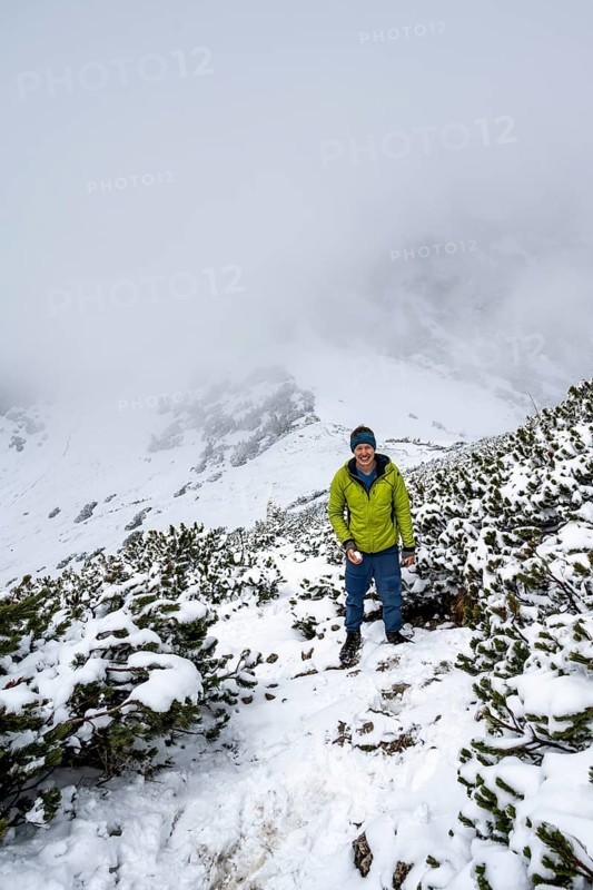 Hikers on a hiking trail in the snow