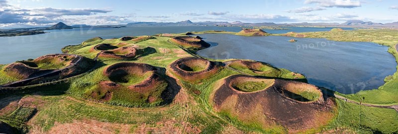 Aerial view of green volcanic crater
