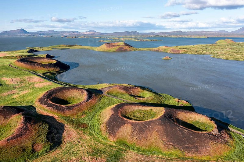 Aerial view of green volcanic crater