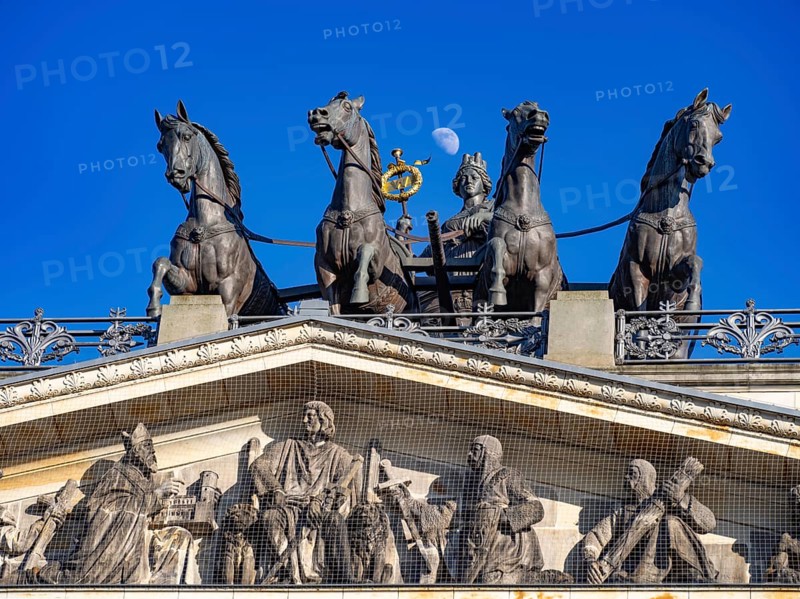 The moon shines above the quadriga with the city goddess Brunonia on the reconstruction of Braunschweig Castle