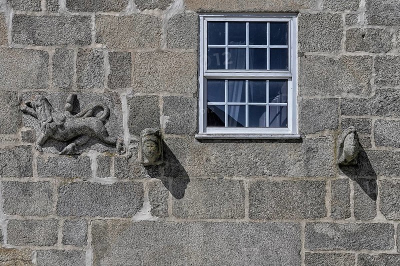 Carvings on the facade of the Black Cat or Lion of Judah House