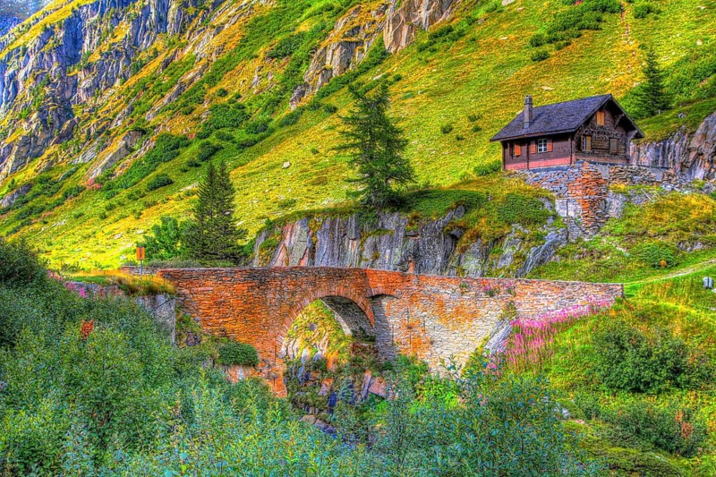 Picturesque old stone bridge in the mountain landscape. Ladstaffel
