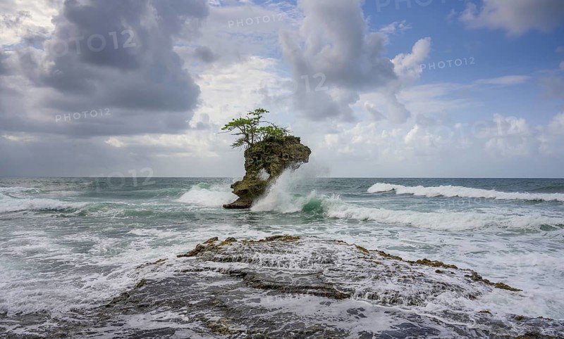 Waves crashing against rocks in the sea