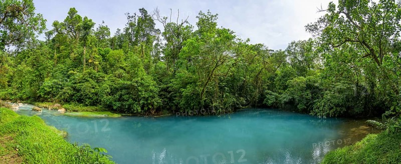 Blue turquoise water of the Rio Celeste caused by sulphur and calcium carbonate