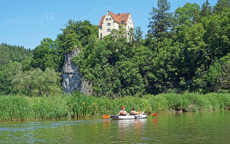 Kayakers paddling on the Danube in front of the end of Gutenstein