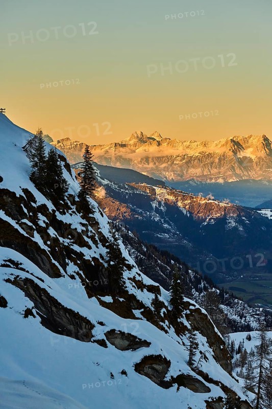 View from Mount Kitzsteinhorn on snow covered mountains down to Zell am See