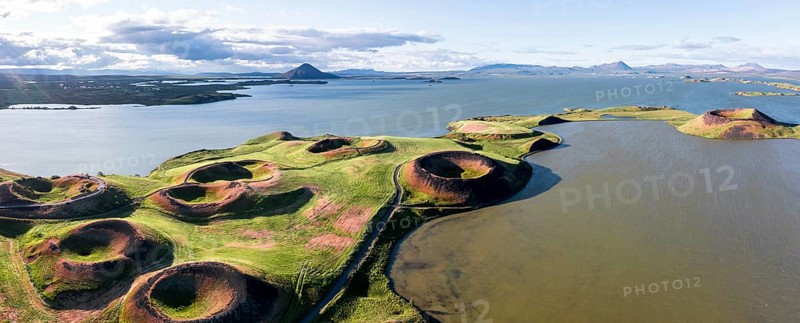 Aerial view of green volcanic crater