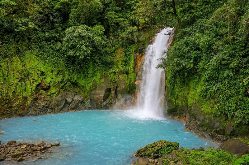 Waterfall with blue turquoise water of the Rio Celeste