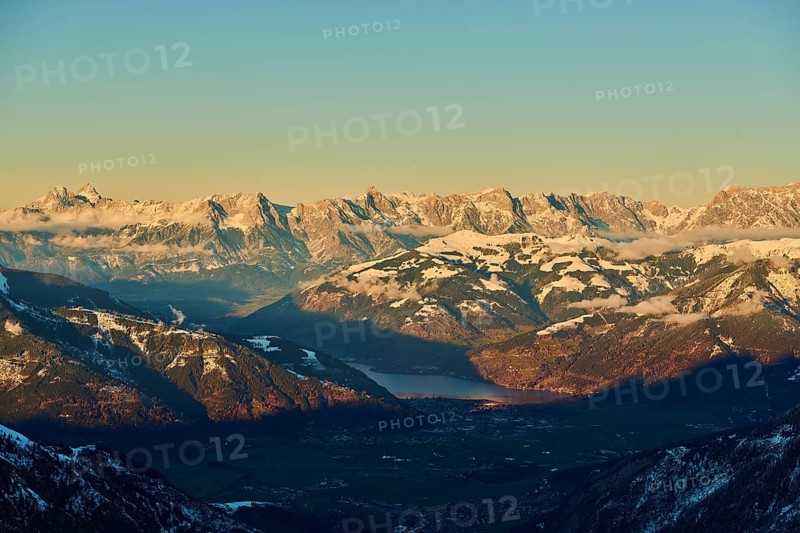 View from Mount Kitzsteinhorn on snow covered mountains down to Zell am See