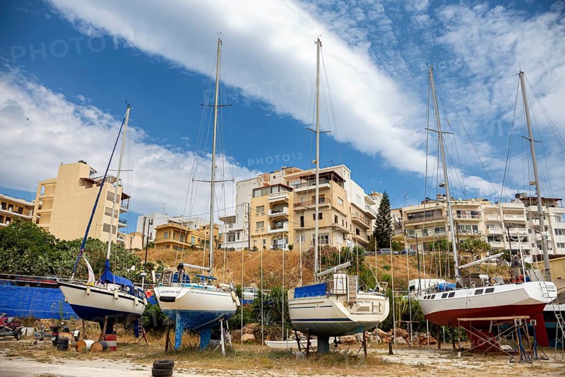 Sailboats in a small shipyard in Agios Nikolaos