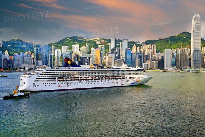 Large cruise ship sails on the Hong Kong River in the early morning