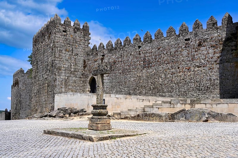 Cross next to castle walls