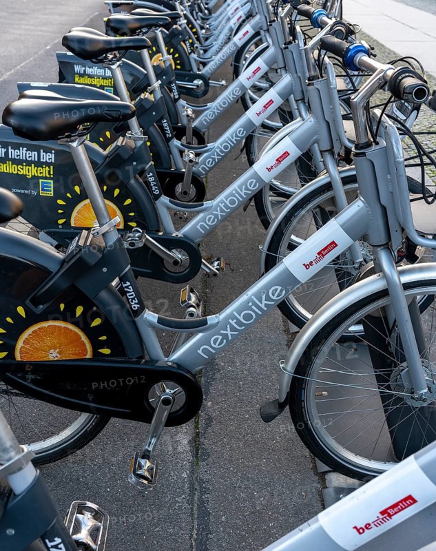 Electric rental bikes at the charging station in front of the Berlin House of Representatives