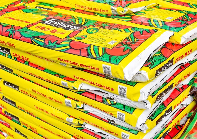 Bags of Levington Gro-Bag tomato planters grow bags stacked up