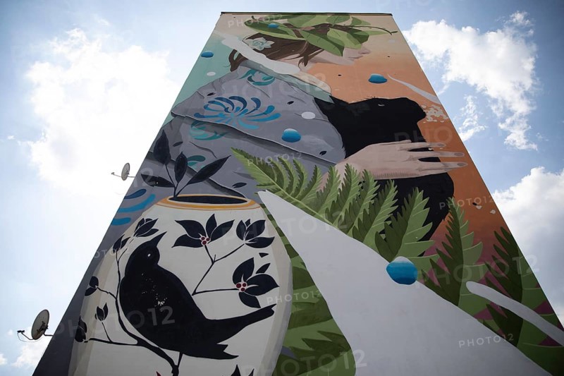 Mural on a residential building in the workers quarter Traktorny Zavod in Minsk