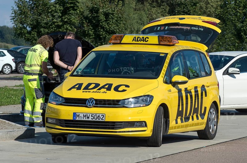 ADAC breakdown service checks defective car at motorway service area on A8 motorway