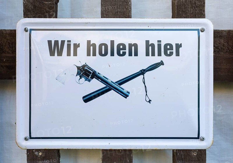 Warning sign We get weapons here