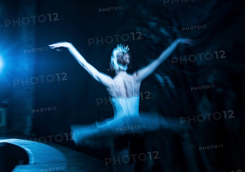 The principal Ballet dancer flying on stage during the performance of Tchaikovskys Swan Lake in St. Petersburg