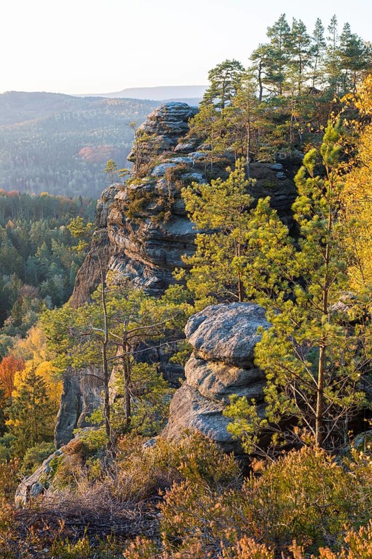 Rocks and autumnal mixed forest on the Pfaffenstein