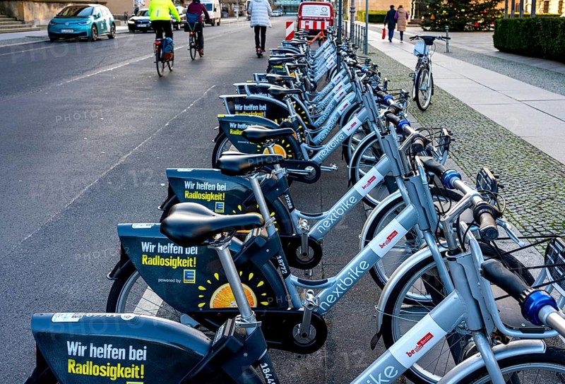 Electric rental bikes at the charging station in front of the Berlin House of Representatives