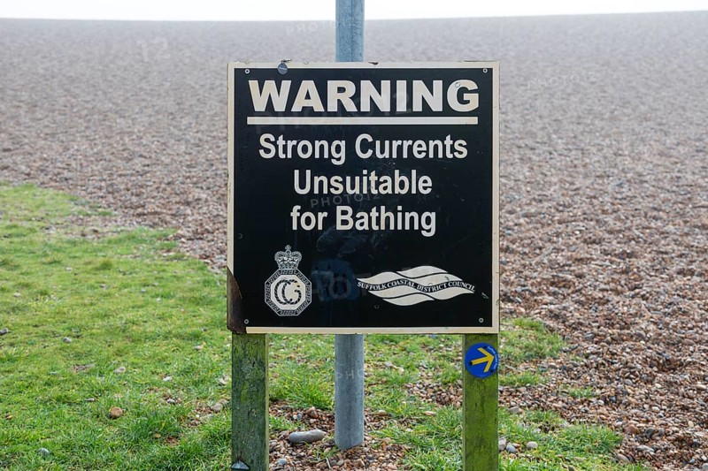 Sign warning of strong currents unsuitable for bathing