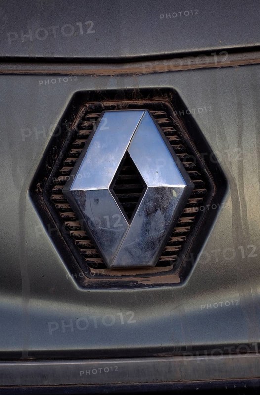 Renault car logo on dirty front panel