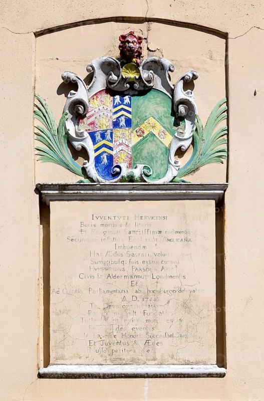 Coat of Arms and Latin inscription on Old School building