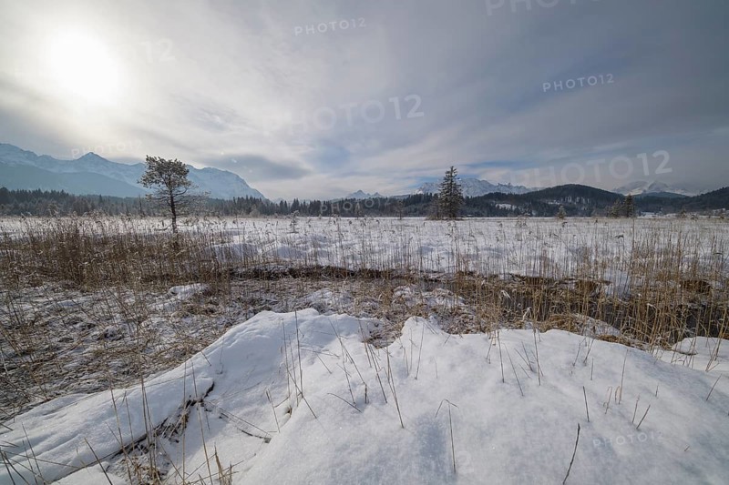 Lake Barmsee with Karwendel mountainrange on morning in winter