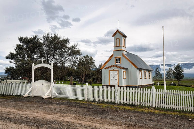 Small wooden church with cemetery