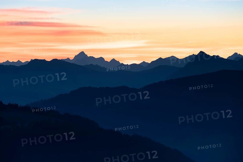 Mountain panorama in front of sunrise from Portlakopf