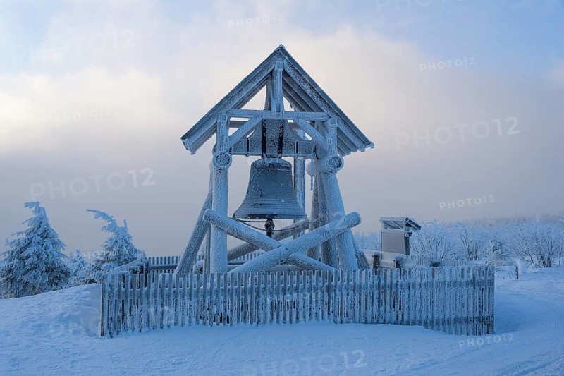 Peace bell on the summit of Fichtelberg with snow in winter