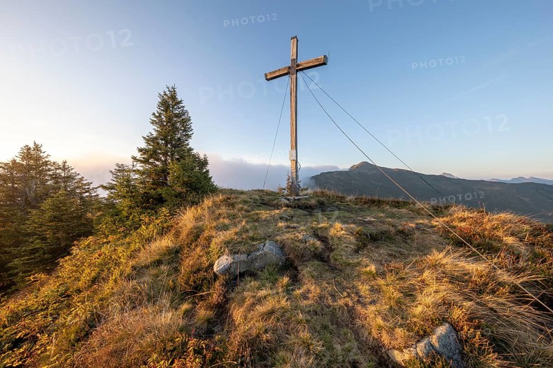 Summit cross in the morning light on Portlakopf
